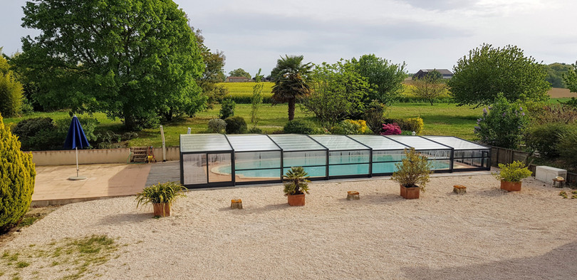 Guinlets pool and cover from house.jpg