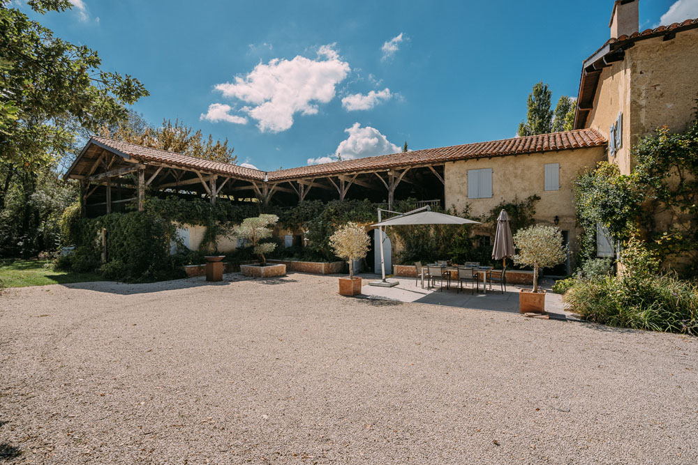 Terrace and old stables with hayloft above.